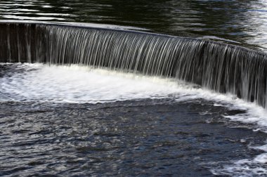 Water Over a Dam clipart