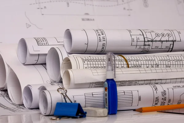 Rolled engineering plan — Stock Photo, Image