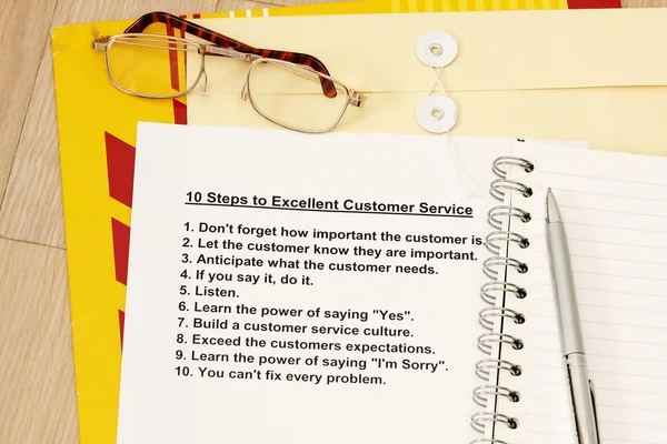 Десять шагов к отличному обслуживанию клиентов — стоковое фото