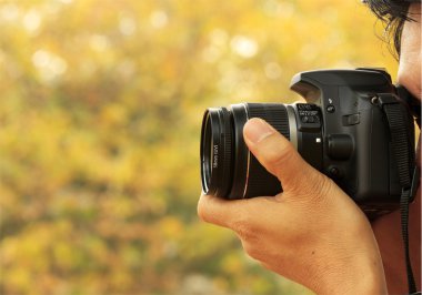 Photographer Taking A Shoot clipart