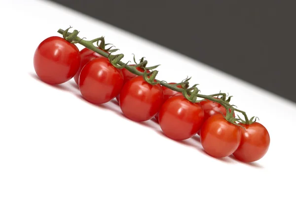 Branch a tomato diagonally — Stock Photo, Image