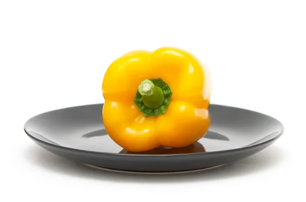 Κίτρινη πιπεριά σε ένα πιάτο — Φωτογραφία Αρχείου