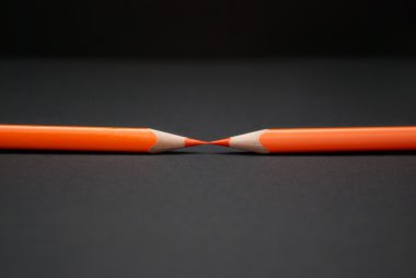 Two orange pencils clipart