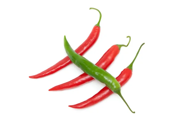 Color chili peppers diagonally — Stock Photo, Image