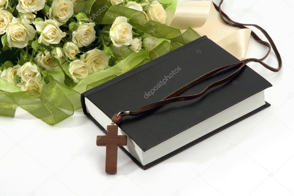 Bible, crucifix , roses on white