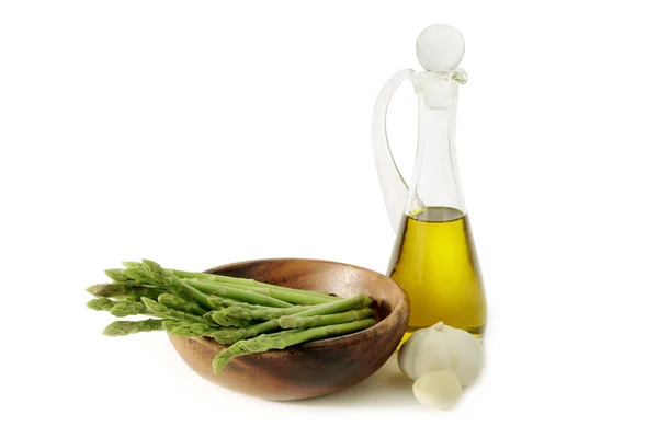 Green asparagus and olive oil — Stock Photo, Image
