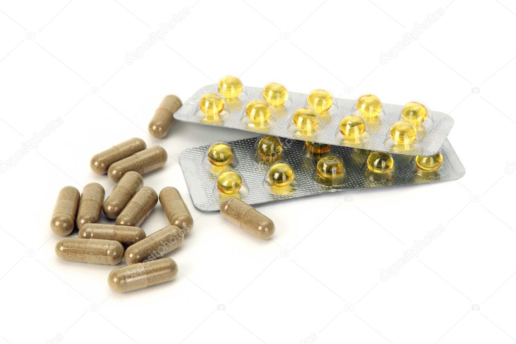 Herbal pills and vitamin E