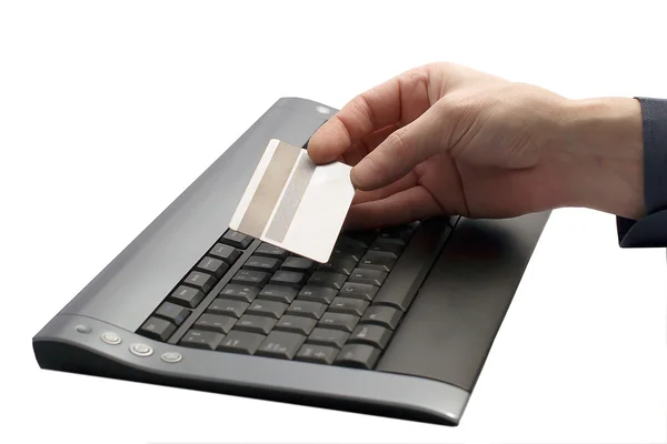 stock image Hand with credit card over keyboard