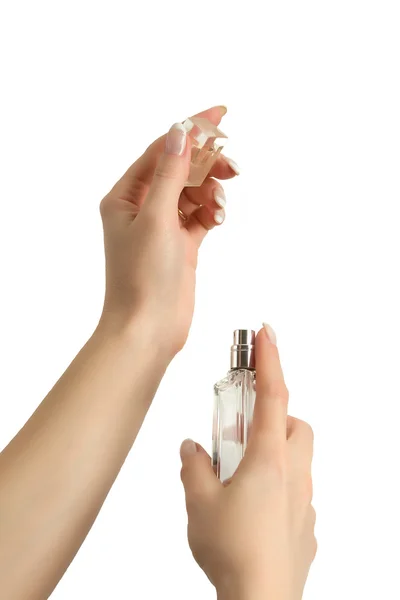 Frauenhände mit Parfümflasche. — Stockfoto