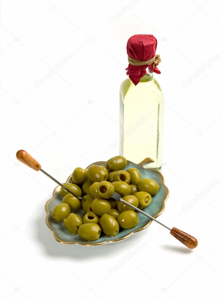 Olives and olive oil in a bottle
