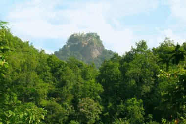 Mountain popa and buddhist monastery clipart