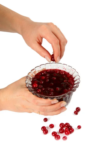Bowl with berry jam in female hands — Stock Photo, Image