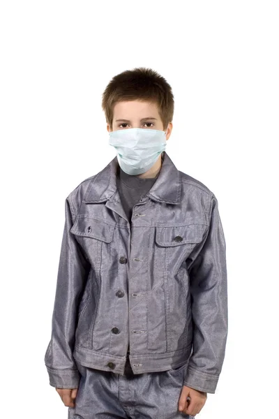 Tonåring i en skyddande mask — Stockfoto