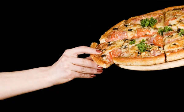 手里的披萨的切片 — 图库照片