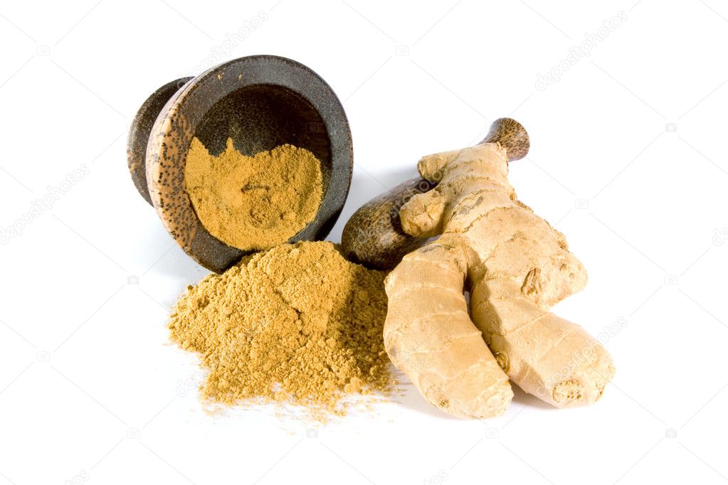 Ginger root and powder with mortar