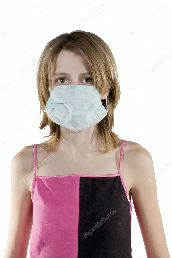 Girl in a protective mask