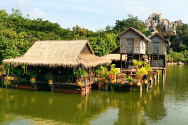 Houses on stilts, Cambodia clipart