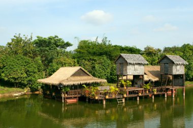 Houses on stilts.Cambodia. clipart