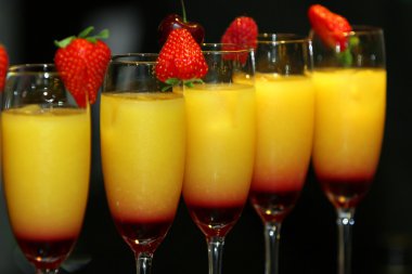 Serving cocktails. Tequila Sunrise. clipart