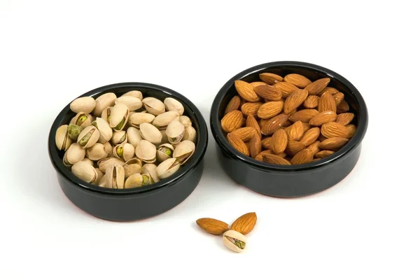 Pistachios and almonds — Stock Photo, Image
