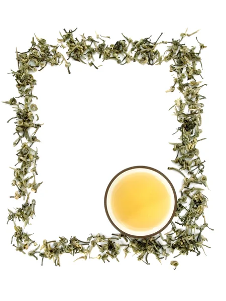 Zelený čaj rám a šálek čaje — Stock fotografie