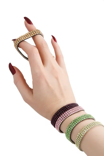 Bracelets on female hand — Stock Photo, Image