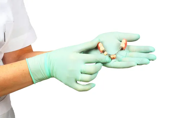 Prótesis dentales, puente y carillas a mano — Foto de Stock