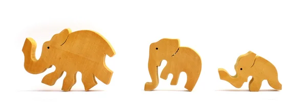 stock image Wooden toy elephants in a row