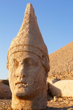 Heads of statues on Mount Nemrut Turkey clipart