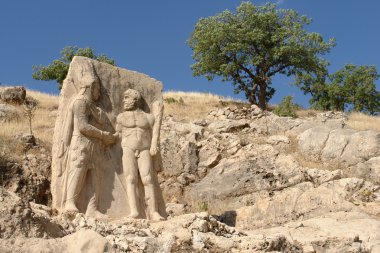 Statues on Mount Nemrut Turkey clipart