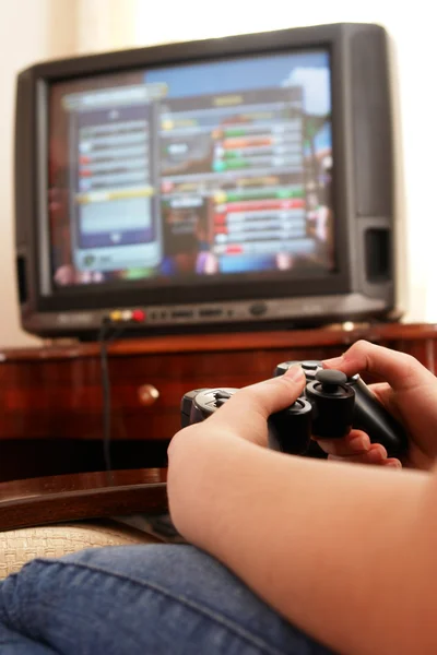 stock image PLAYING VIDEO CONSOLE GAME