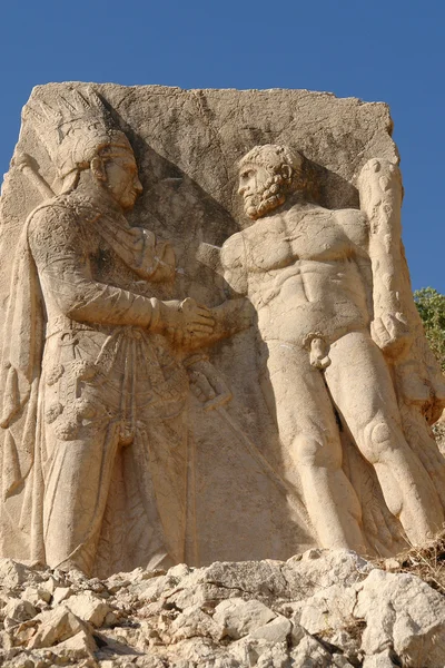 Statyer på mount nemrut Turkiet Royaltyfria Stockfoton