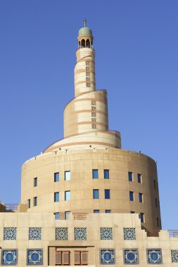 Minaret of islamic center in Doha Qatar clipart