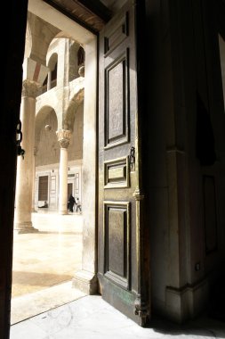 Door in historical umayyad mosque in dam clipart