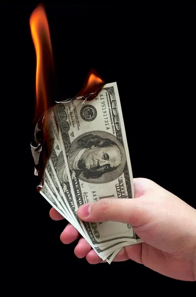 Dollari in fiamme Immagini Stock Royalty Free