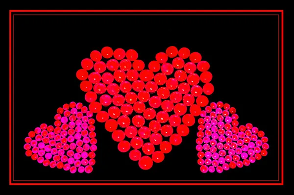 Hearts on black background — Stock Photo, Image