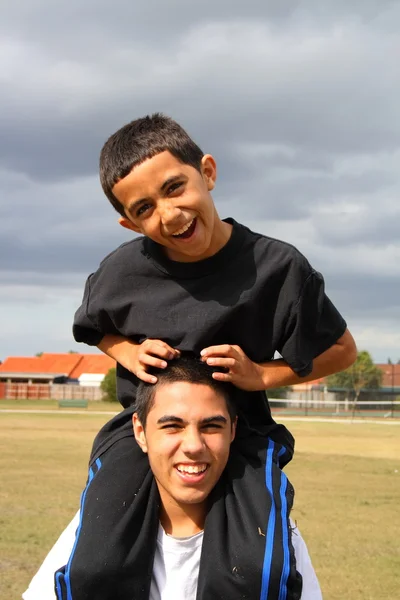 Teen and child playing — Stock Photo, Image