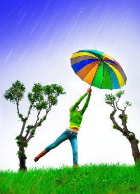 GIRL FLYING WITH UMBRELLA clipart