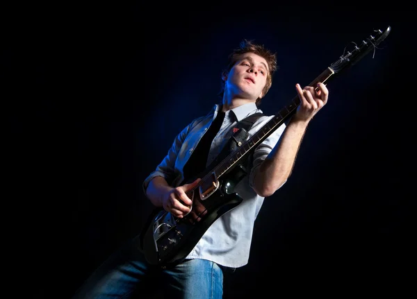 Muž s kytarou — Stock fotografie