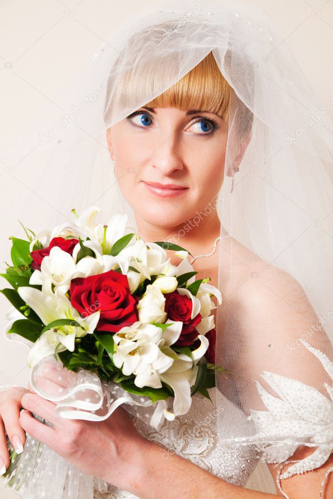 Blond bride with the bouquet.