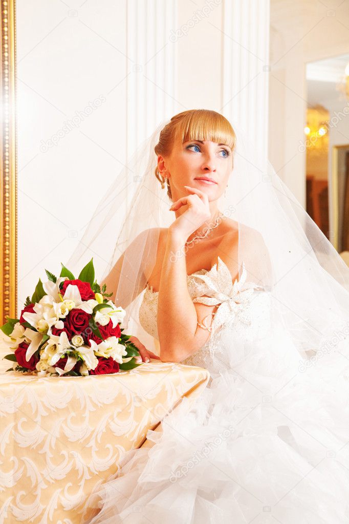 Blond bride with the bouquet.