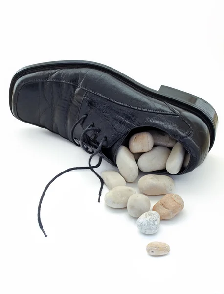 Stein im Schuh — Stockfoto
