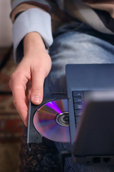 Insert disc in player — Stock Photo, Image