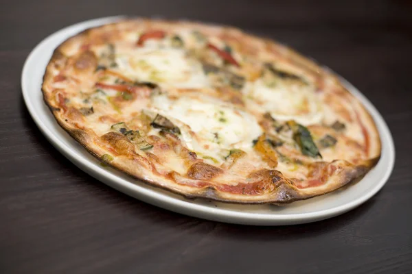 Goats cheese and roasted vegatable pizza — Stock Photo, Image