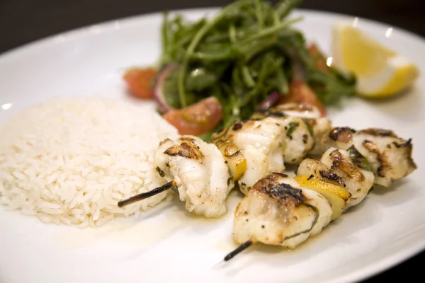 stock image Monkfish skewers with Basmati rice