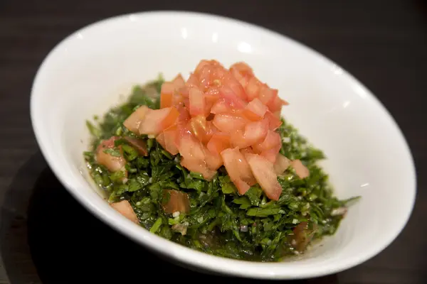 stock image Rocket, Onion and tomato salad