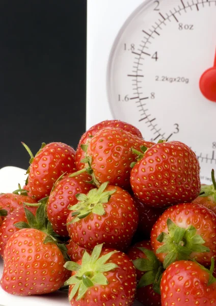 stock image Fresh Strawberrys and wieght scale