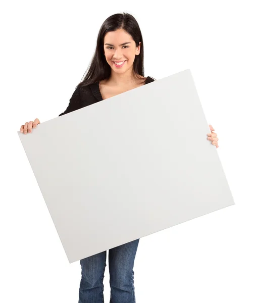 Jeune femme tenant un signe blanc blanc — Photo