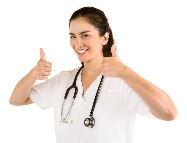 Enfermeira sorridente com polegares para cima Fotografia De Stock