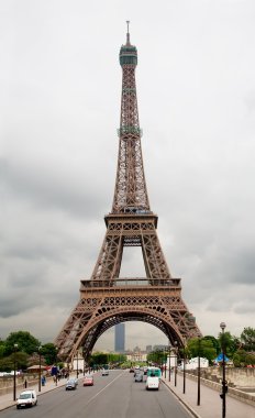 Eiffel Tower Under a Stormy Sky clipart